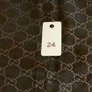 #24 Large Gucci Dust Jacket Handbag